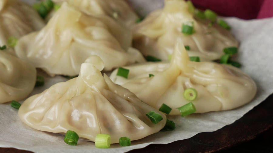 Xiaolongbao Food Topped With Green Onions Wallpaper