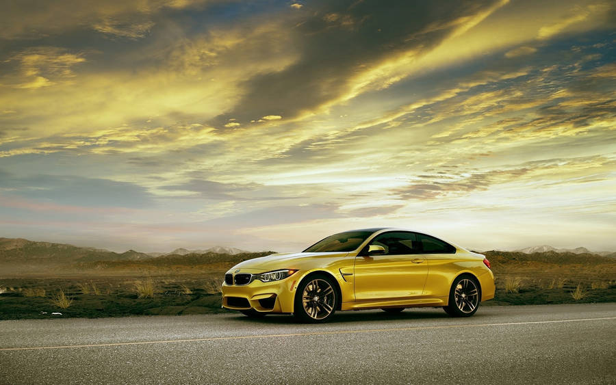 Yellow Bmw M4 On The Road Wallpaper