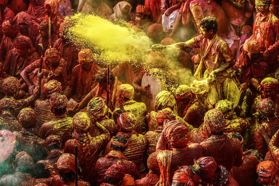 Yellow Dye During Indian Holi Wallpaper