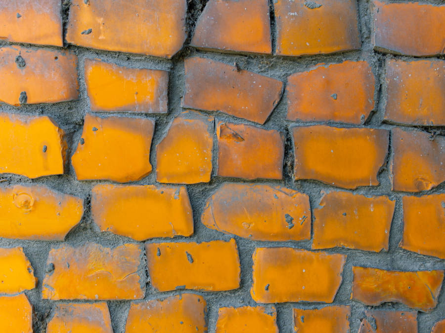 Yellow Mosaic Stone Wall With Concrete Wallpaper