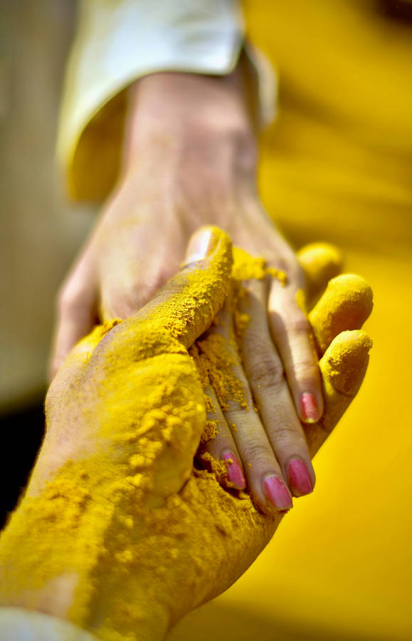 Yellow Powder During Happy Holi Hd Wallpaper