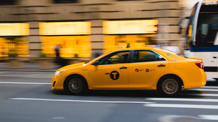 Yellow Taxi Cab Motion Blur Wallpaper