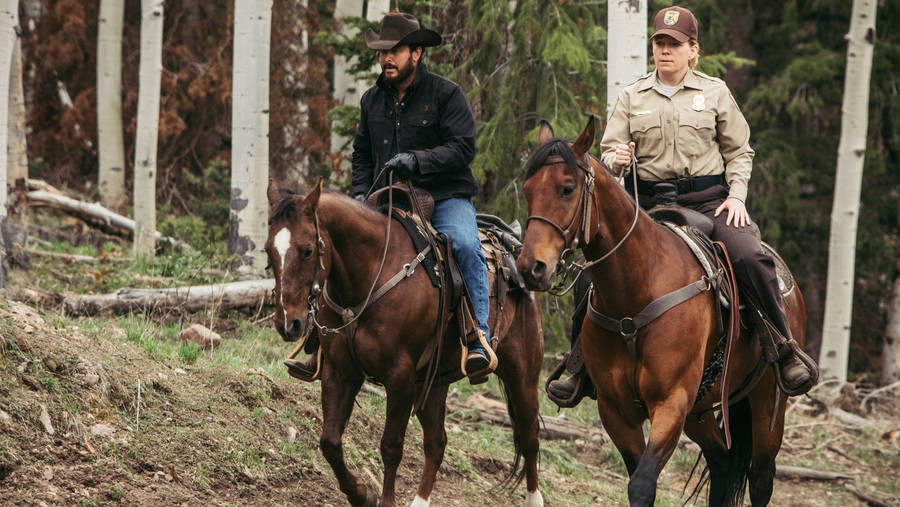 Yellowstone Tv Show Rip With Ranger Wallpaper