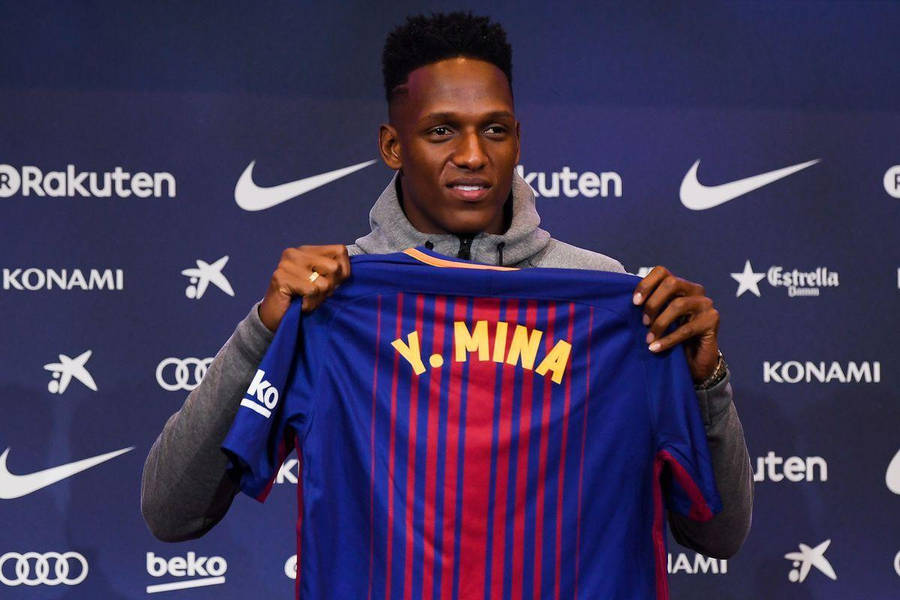 Yerry Mina Posing With Jersey Wallpaper