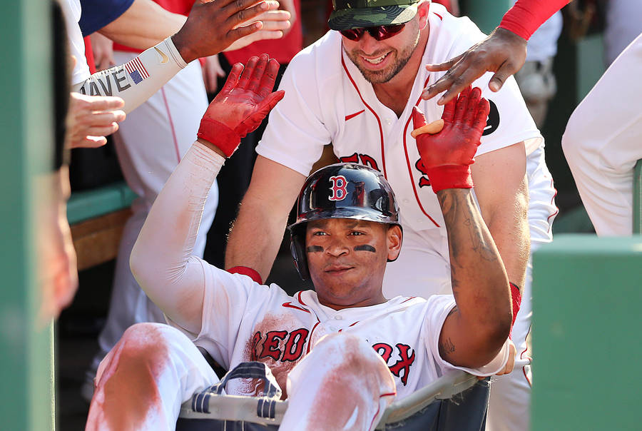 Yoan Moncada With Red Sox Teammates Wallpaper