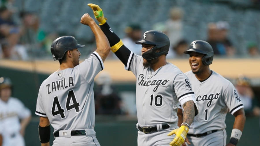 Yoan Moncada With White Sox Teammates Wallpaper