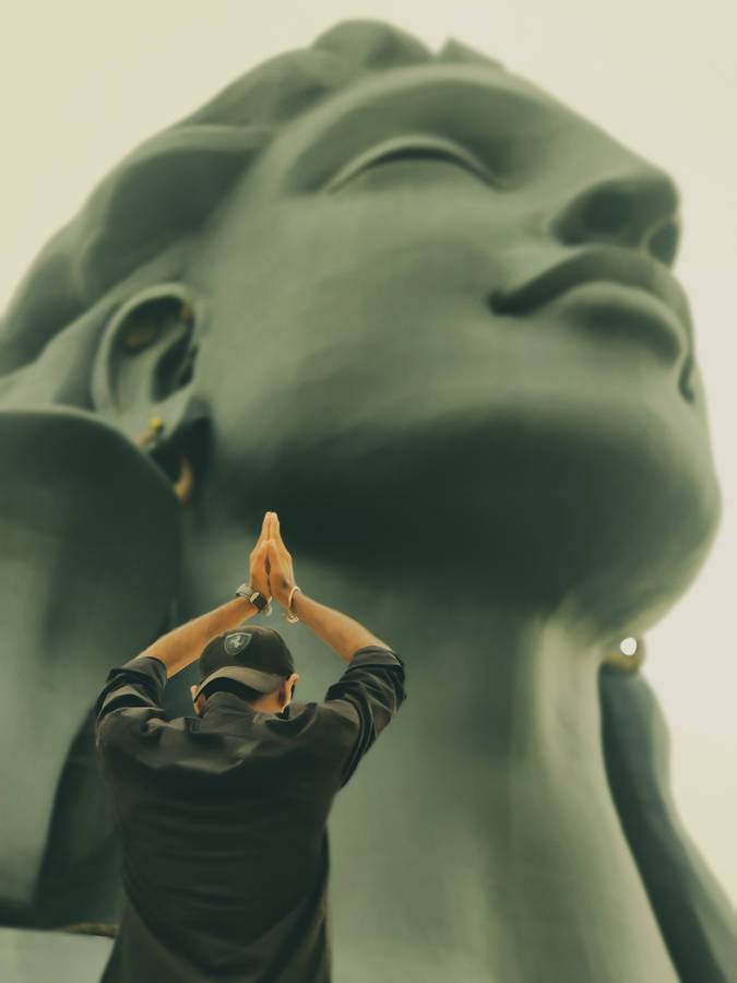 Yogi Practicing Yoga With Adiyogi Shiva Wallpaper