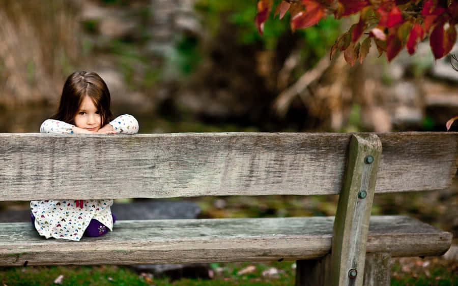 Young Lady Waiting For Her Parents To Come Wallpaper