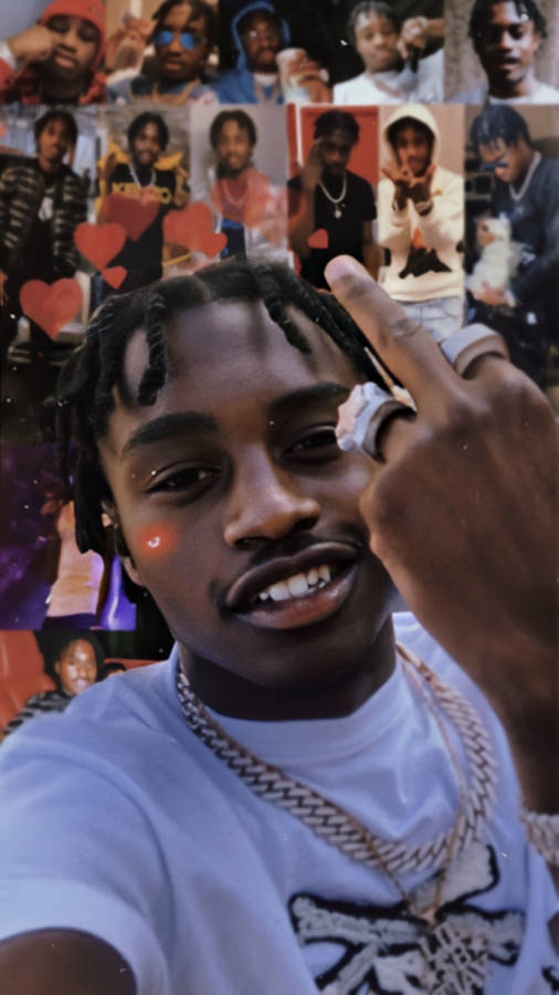 Young Lil Tjay With Poster Wallpaper