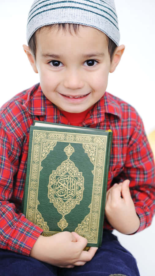 Young Muslim Boy Quran Book Wallpaper