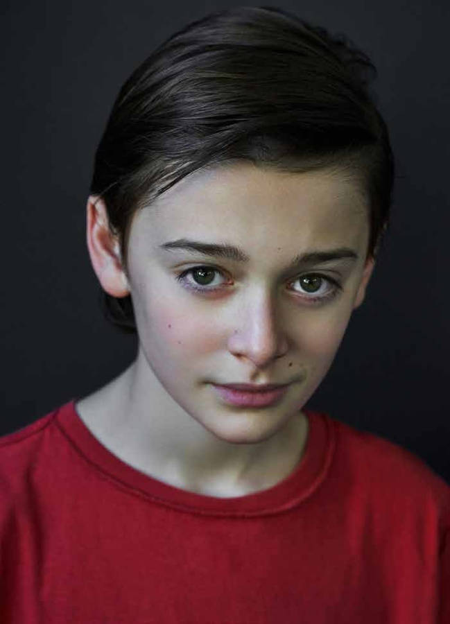 Young Noah Schnapp With Red Shirt Wallpaper