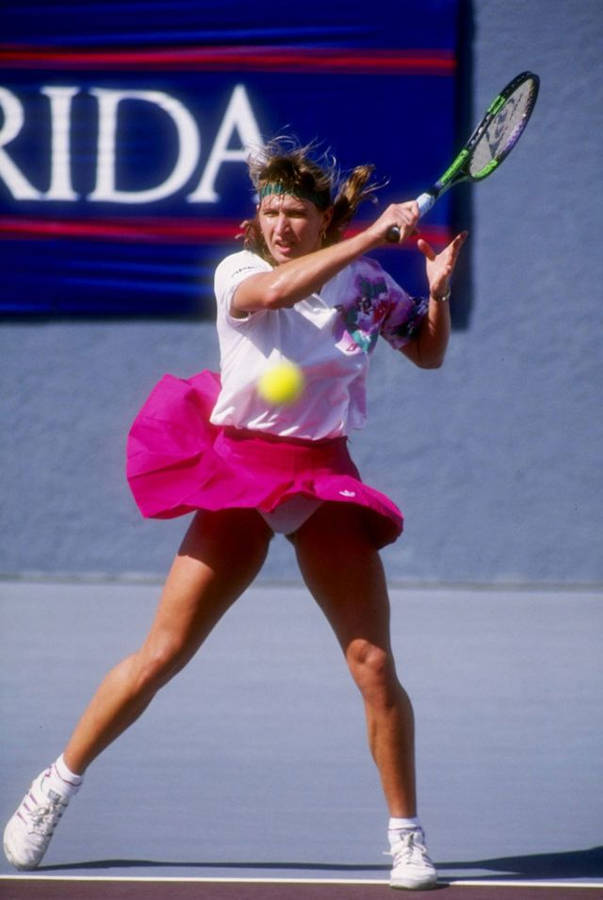 Young Steffi Graf Hitting The Ball Wallpaper