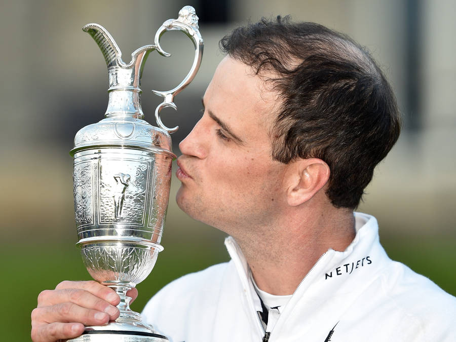 Zach Johnson Kissing Trophy Wallpaper