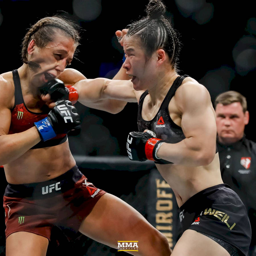 Zhang Weili Striking Joanna Jędrzejczyk Wallpaper