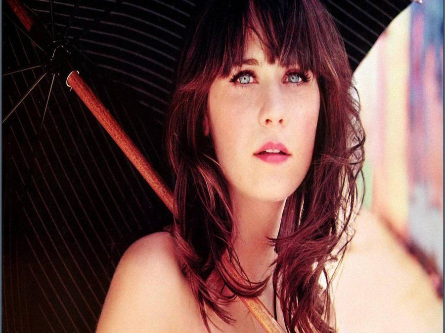 Zooey Deschanel Holding Umbrella Wallpaper