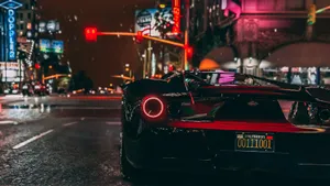 1920 X 1080 Night City Black Sports Car Wallpaper