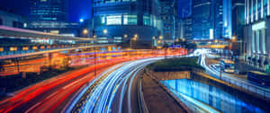3440x1440 Neon Motion Light Highway Wallpaper