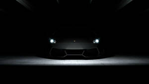 4k Black Car In Darkness Wallpaper