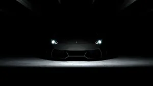 4k Black Car In Darkness Wallpaper