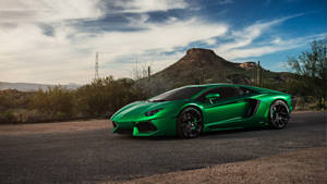 4k Green Car At Desert Wallpaper