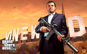 4k Gta 5 Michael With Gun Vinewood Wallpaper