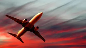 4k Plane Flying In Red Sky Wallpaper