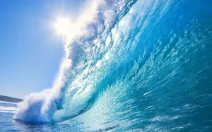 A Beautiful Stretch Of The Ocean On A Sunny Day. Wallpaper