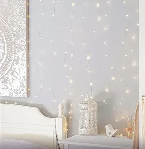 A Bedroom With A Bed And A Bedside Table Wallpaper