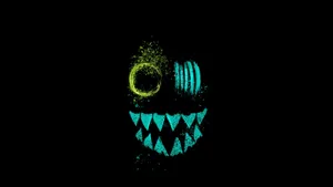 A Black And Green Skateboard With A Green Face Wallpaper