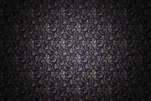 A Black And Silver Wallpaper With Swirls Wallpaper