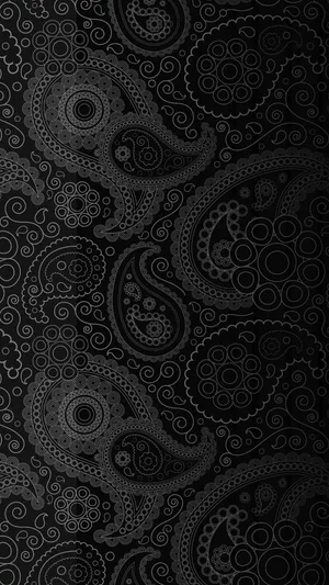 A Black And White Paisley Pattern On A Black Background Wallpaper