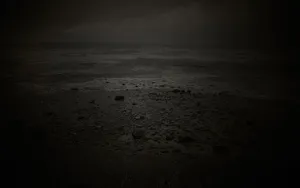 A Black And White Photo Of A Dark Ocean Wallpaper