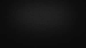 A Black Background With A Light Shining On It Wallpaper