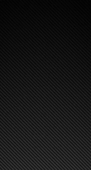 A Black Carbon Fiber Background With A Black Background Wallpaper