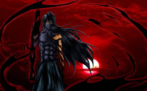 A Black Man With Long Hair Standing In Front Of A Red Sunset Wallpaper