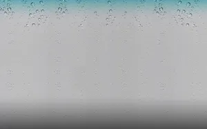 A Blue And White Background With Water Droplets Wallpaper