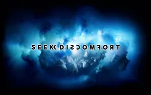 A Blue Background With The Words'traumaseek' Wallpaper