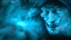 A Blue Face With A Blue Light Behind It Wallpaper