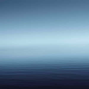 A Blue Sky With A Calm Ocean Wallpaper