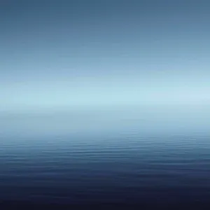 A Blue Sky With A Calm Ocean Wallpaper