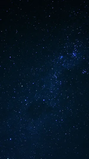 A Blue Sky With Stars Wallpaper