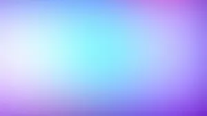 A Blurred Background With Blue And Purple Colors Wallpaper
