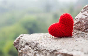 A Bright And Vibrant Red Heart, Bursting With Love Wallpaper