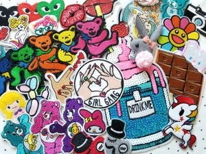 A Bunch Of Different Embroidered Stickers On A White Background Wallpaper
