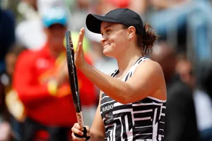 A Charismatic Close-up Of Ashleigh Barty Showcasing Her Dimple Wallpaper