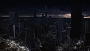 A City At Night With Tall Buildings Wallpaper