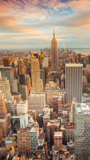 A Cityscape With Buildings And A Skyline Wallpaper