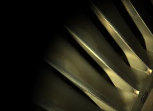 A Close Up Of A Metal Fan Wallpaper