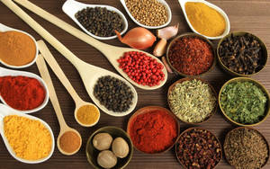 A Colorful Array Of Herbs And Spices Wallpaper