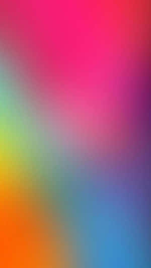 A Colorful Blurred Background With A Rainbow Of Colors Wallpaper